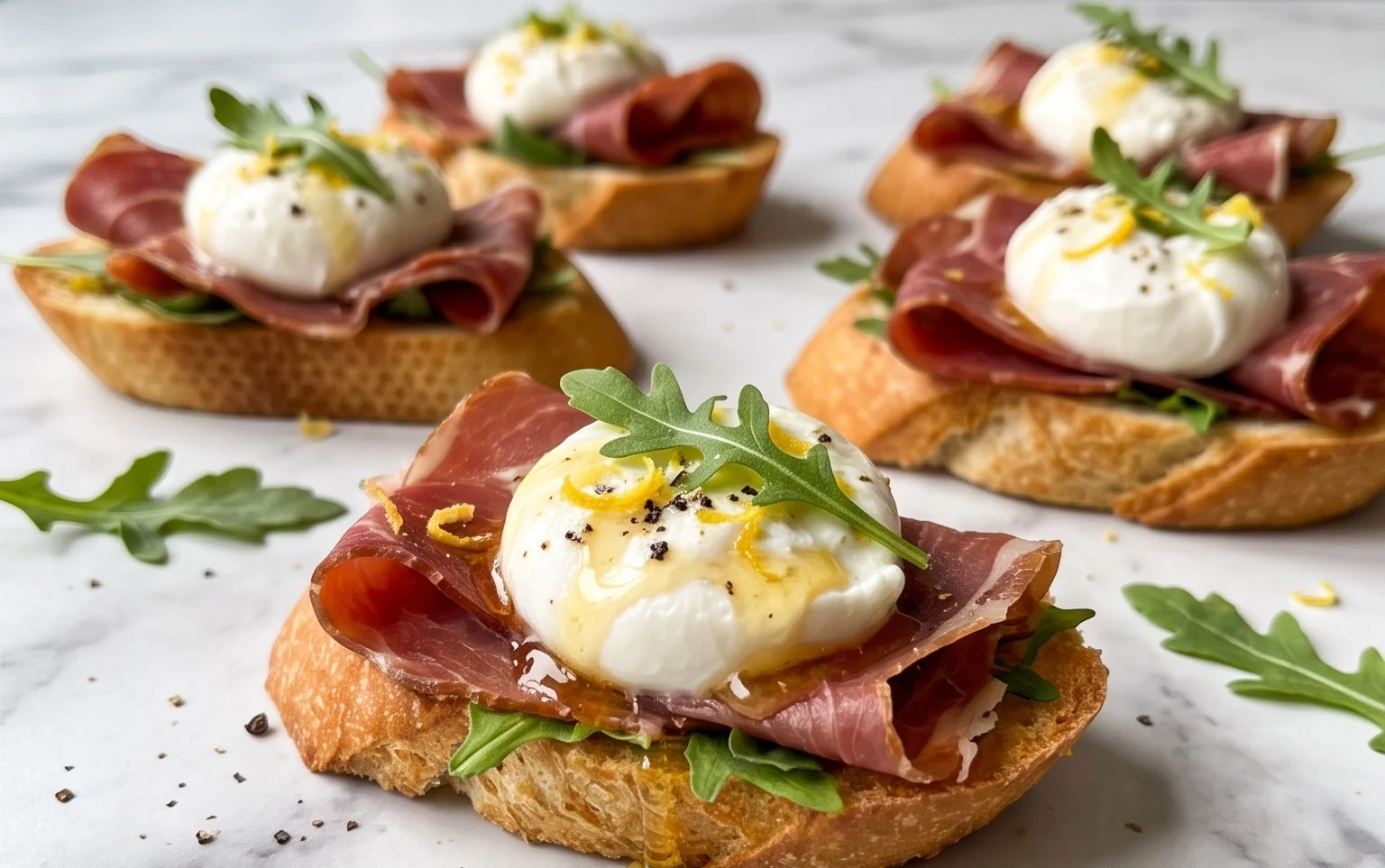 Beef Prosciutto Crostini with Burrata and Lemon Honey Drizzle